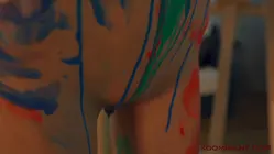 a woman with paint on her body